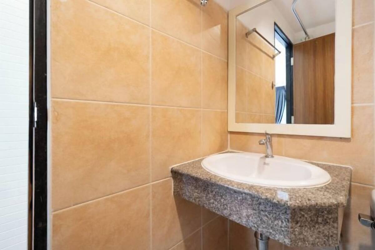 Bathroom | Shower, free toiletries, hair dryer, slippers