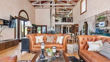 House, Multiple Beds, Balcony, Mountain View | Living area | TV, fireplace, MP3 dock