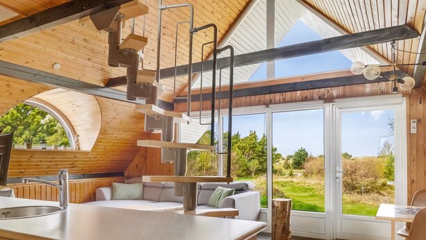 A modern kitchen with a large island, built-in appliances, and a view of the outdoors. - "Antero" - 4km from the sea by Interhome (Rømø)