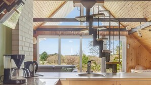 A modern kitchen with a large window, a coffee maker, and a sink. - "Antero" - 4km from the sea by Interhome (Rømø)