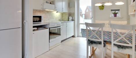 Fridge, microwave, oven, cookware/dishes/utensils