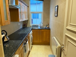 Apartment | Private kitchen | Fridge, microwave, oven, stovetop