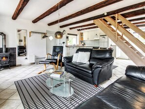 Télévision, cheminée, lecteur de DVD