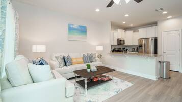 Townhome, Multiple Beds, Patio, Garden View (Pride of PCB) | Living area | 42-inch flat-screen TV with digital channels