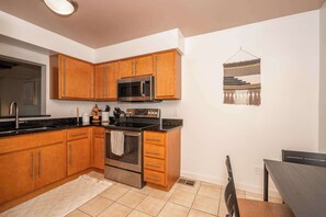 House, Multiple Beds, Balcony | Private kitchen | Fridge, microwave, oven, stovetop