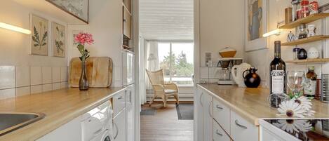 Fridge, oven, highchair, cookware/dishes/utensils