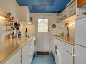 Fridge, oven, high chair, cookware/dishes/utensils