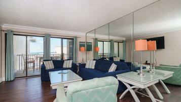 Condo, Multiple Beds, Balcony, Partial Ocean View (Sea Forever) | Living area | 42-inch flat-screen TV with digital channels