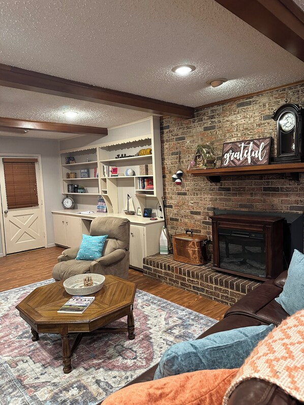 Smart TV, fireplace, books