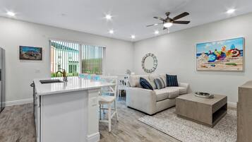 Townhome, Multiple Beds, Pool Access, Garden View | Living area | Flat-screen TV