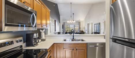 Condo, Multiple Beds, Balcony, Golf View (T Time Getaway) | Private kitchen | Coffee/tea maker, dining tables