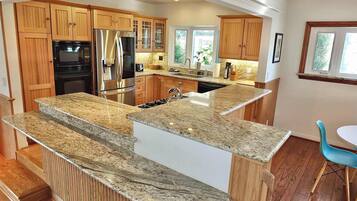 House, Multiple Beds, Pool Access, Pool View (The Belmont Beach Bungalow) | Private kitchen | Fridge, microwave, oven, stovetop