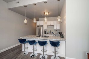 Condo, 2 Queen Beds, Kitchen | Private kitchen | Fridge, microwave, oven, stovetop - The Heart of Madison 2 (Covington)