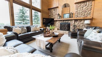 Smart TV, chimenea, reproductor de DVD y tenis de mesa