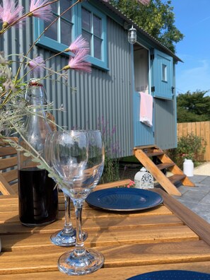 Enjoy a meal or social gathering on the outdoor deck with a beautiful view.