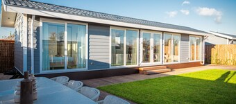 Waterfront luxury tiny home near Amsterdam with spacious private garden