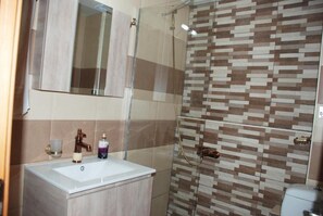 Hair dryer, towels, toilet paper
