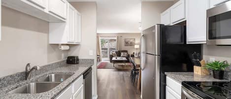 Condo, Multiple Beds, Patio, Garden View (The Spoke and Urban Farmhouse Duo) | Private kitchen | Coffee/tea maker