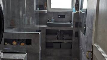 Shower, towels, soap, shampoo