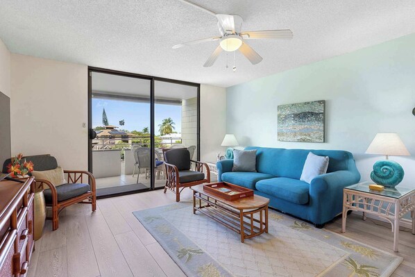 Condo, Multiple Beds, Balcony, Partial Ocean View (Plumeria Hale) | Living area | 42-inch flat-screen TV with digital channels