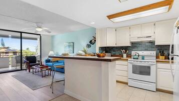 Condo, Multiple Beds, Balcony, Partial Ocean View (Plumeria Hale) | Private kitchen | Fridge, microwave, oven, stovetop