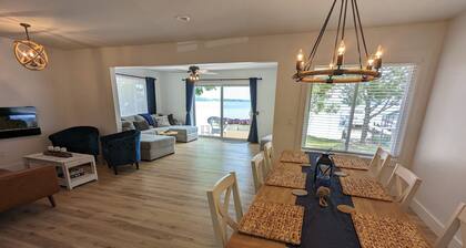 NEW! Renovated lakeside cottage with a private sandy beach. Great Location!