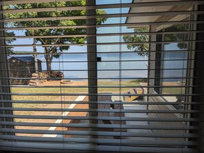 Enjoy a serene outdoor setting with a family-friendly deck featuring a picnic table and tire swing.