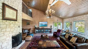 House, Multiple Beds, Pool Access, Pool View (Paleface Lake Dreams) | Living area | 50-inch flat-screen TV with cable channels, fireplace