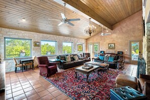 House, Multiple Beds, Pool Access, Pool View (Paleface Lake Dreams) | Living area | 50-inch flat-screen TV with cable channels, fireplace - 7br Home w/ Pool - Perfect for Family Reunions (Spicewood)
