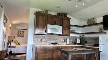 Fridge, microwave, stovetop, coffee/tea maker