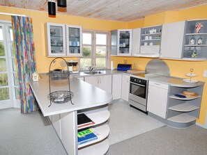 Fridge, microwave, oven, cookware/dishes/utensils