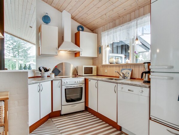 Fridge, microwave, dishwasher, cookware/dishes/utensils