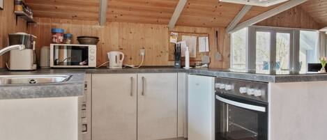 Fridge, microwave, oven, cookware/dishes/utensils