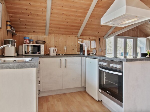 Fridge, microwave, oven, cookware/dishes/utensils