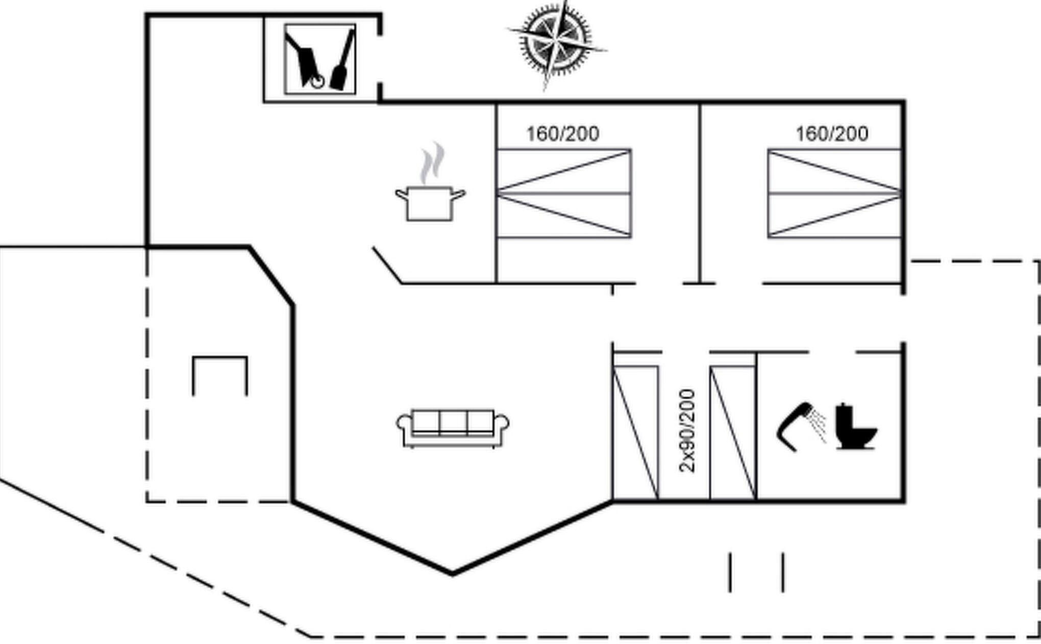A floor plan with a kitchen, two bathrooms, a living area, and a staircase.