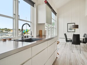 Fridge, microwave, dishwasher, cookware/dishes/utensils