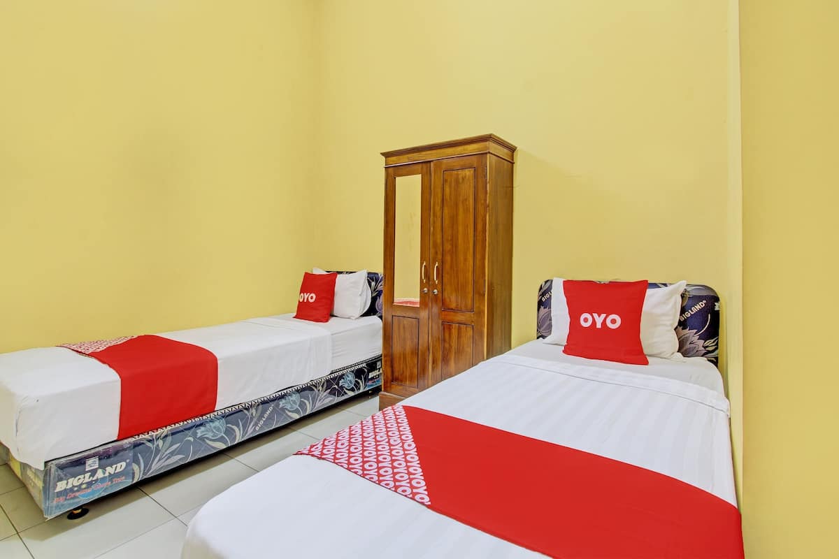 Chambre Standard avec lits jumeaux | Wi-Fi gratuit, draps fournis