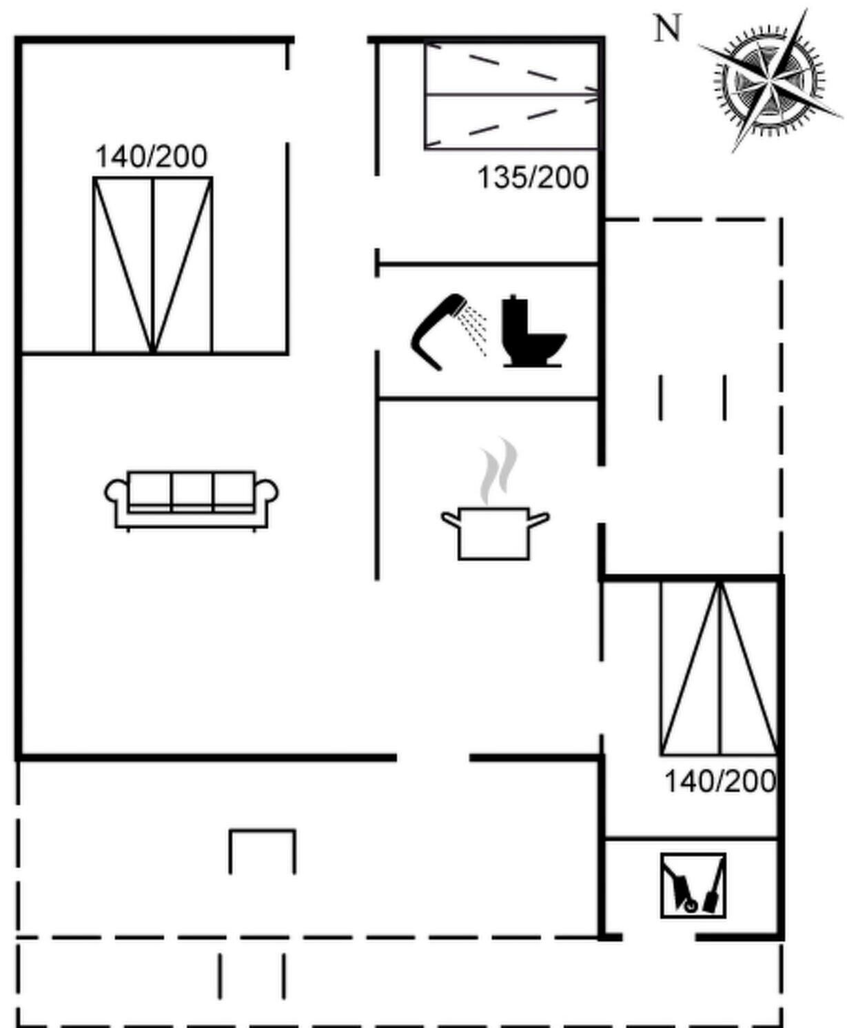 A floor plan with a kitchen, a living area with a sofa, and a bathroom.