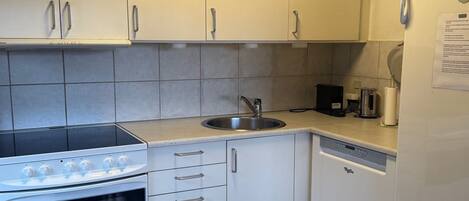 Fridge, oven, dishwasher, high chair
