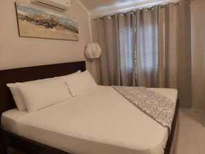 2 quartos, ferros/tábuas de passar roupa, Wi-Fi de cortesia