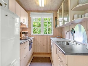 Fridge, microwave, cookware/dishes/utensils