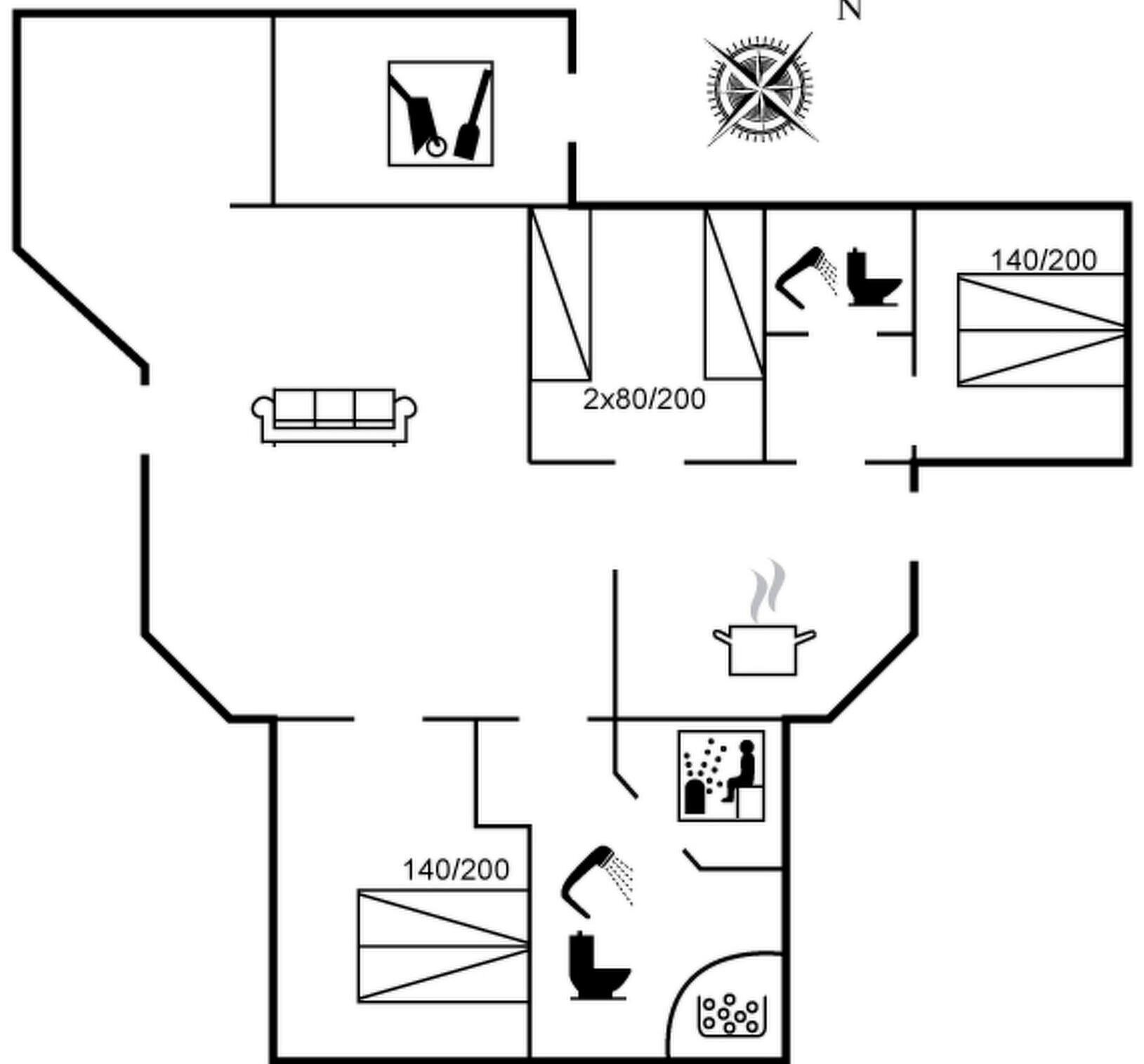 Un plano de planta que muestra una cocina, un comedor y un baño.