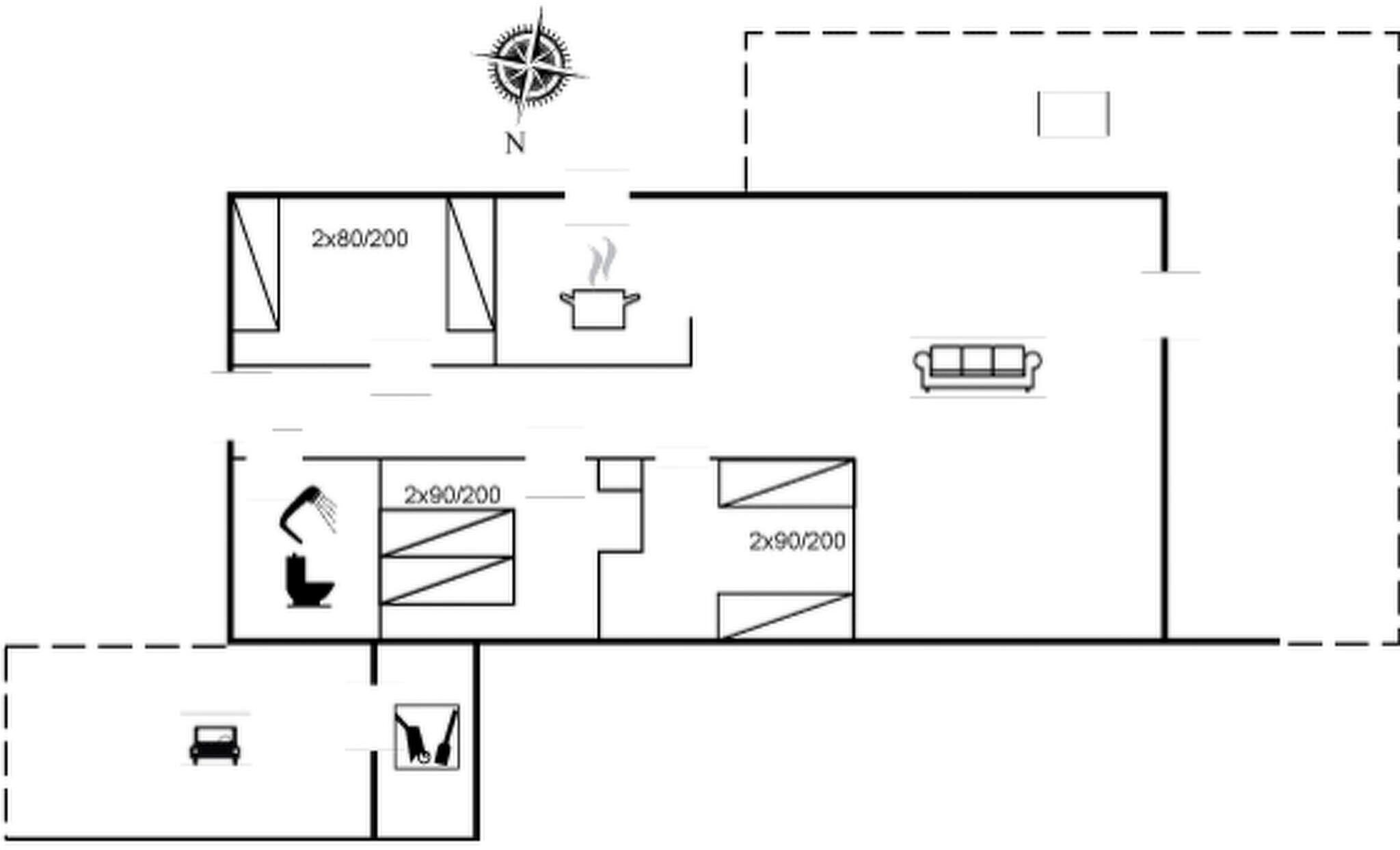 Un plan d’étage comprenant une cuisine, un coin repas et une salle de bain séparée.