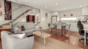 Luxury Townhome | Living area | 55-inch Smart TV with digital channels, Netflix, streaming services