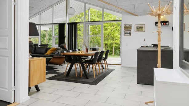 A spacious, modern interior with a dining area, kitchen, and seating space. - "Barth" - 950m from the sea by Interhome (Vig)