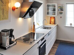 Fridge, microwave, dishwasher, cookware/dishes/utensils