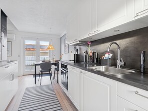Fridge, microwave, dishwasher, cookware/dishes/utensils