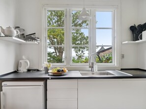 Fridge, microwave, cookware/dishes/utensils