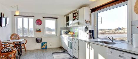 Fridge, microwave, dishwasher, cookware/dishes/utensils