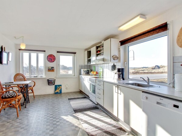 Fridge, microwave, dishwasher, cookware/dishes/utensils
